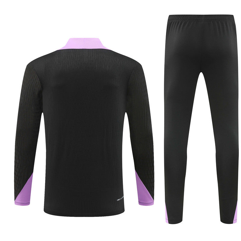 24-25 England black with purple half zip